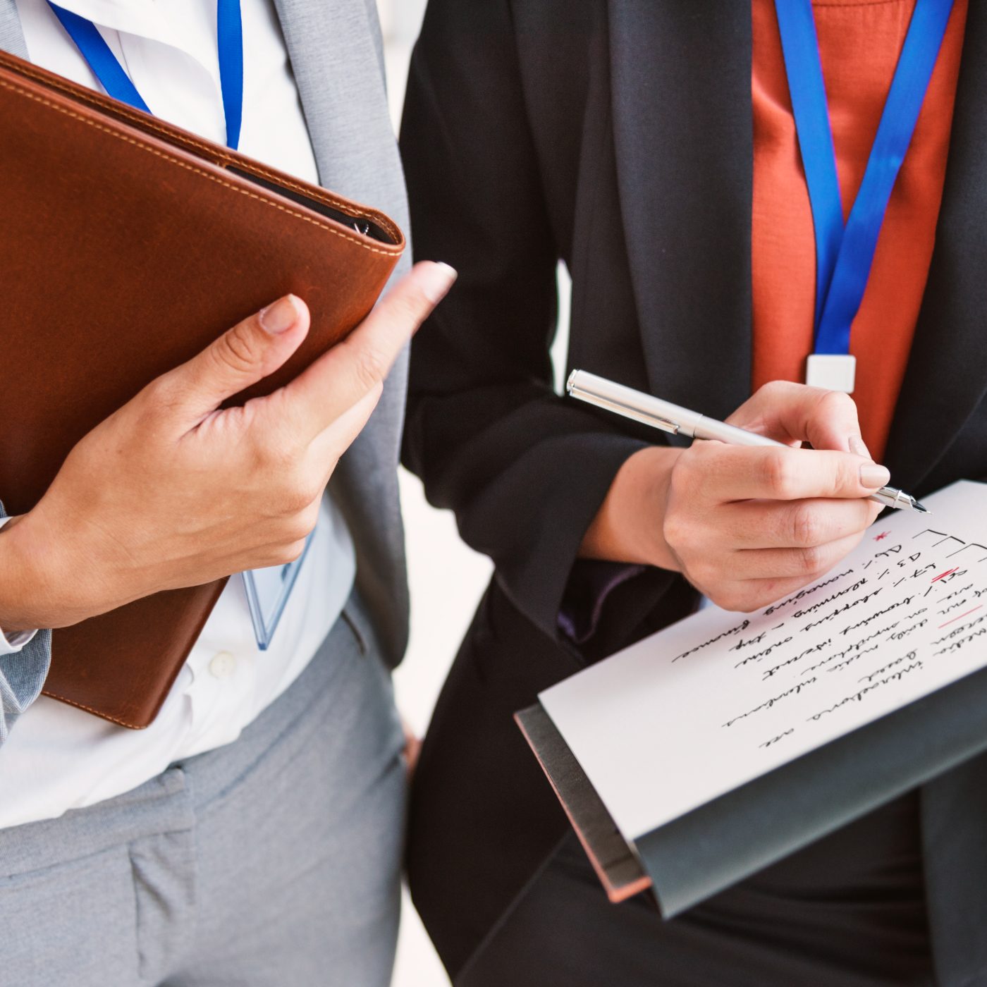 Two professionals reviewing a project document together